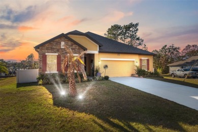 This exquisite 4-bedroom, 3-bathroom home in Oak Village of on Sugarmill Woods Golf and Country Club in Florida - for sale on GolfHomes.com, golf home, golf lot