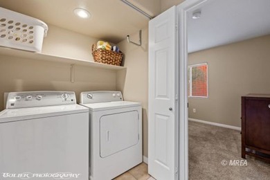 Welcome to your dream retreat! This stunning 3 bed, 2 bath top on The Oasis Golf Club in Nevada - for sale on GolfHomes.com, golf home, golf lot