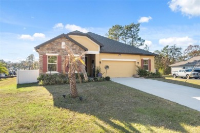 This exquisite 4-bedroom, 3-bathroom home in Oak Village of on Sugarmill Woods Golf and Country Club in Florida - for sale on GolfHomes.com, golf home, golf lot