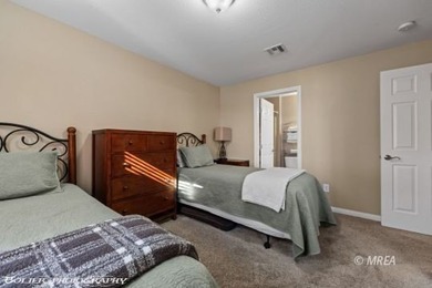 Welcome to your dream retreat! This stunning 3 bed, 2 bath top on The Oasis Golf Club in Nevada - for sale on GolfHomes.com, golf home, golf lot