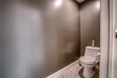 Discover sophistication and comfort in this striking home on Harrison Country Club in Arkansas - for sale on GolfHomes.com, golf home, golf lot