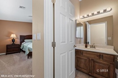 Welcome to your dream retreat! This stunning 3 bed, 2 bath top on The Oasis Golf Club in Nevada - for sale on GolfHomes.com, golf home, golf lot