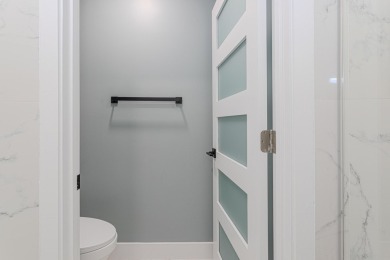 Completely Renovated Pool Home in Madison Green!This 4-bedroom on The Links At Madison Green in Florida - for sale on GolfHomes.com, golf home, golf lot