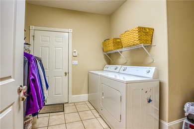 Discover sophistication and comfort in this striking home on Harrison Country Club in Arkansas - for sale on GolfHomes.com, golf home, golf lot