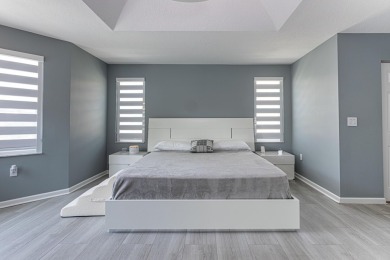 Completely Renovated Pool Home in Madison Green!This 4-bedroom on The Links At Madison Green in Florida - for sale on GolfHomes.com, golf home, golf lot