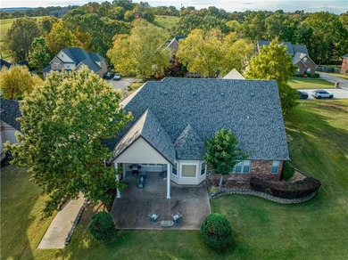 Discover sophistication and comfort in this striking home on Harrison Country Club in Arkansas - for sale on GolfHomes.com, golf home, golf lot