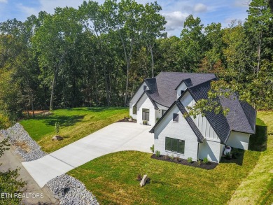 Discover your dream home at 182 Oostanali Way, Loudon, TN on Toqua Golf Course - Loudon County in Tennessee - for sale on GolfHomes.com, golf home, golf lot