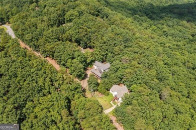 Come home to this mountain retreat located in the sought-after on The Highlands Course at Lake Arrowhead in Georgia - for sale on GolfHomes.com, golf home, golf lot
