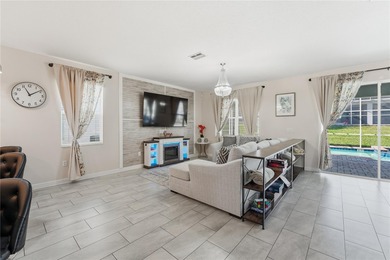 Overhauled by  Superhosts and designed for five-star stays -- on The Oasis Club at Champions Gate in Florida - for sale on GolfHomes.com, golf home, golf lot