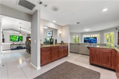 Welcome to this beautifully landscaped 4 bedroom, 2 bath home on St. Lucie Trail Golf Club in Florida - for sale on GolfHomes.com, golf home, golf lot