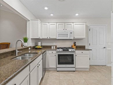 ROOF 2020. HVAC 2021. BEAUTIFULLY UPDATED Willow/Wisteria Model on The Links of Spruce Creek in Florida - for sale on GolfHomes.com, golf home, golf lot
