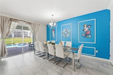 Overhauled by  Superhosts and designed for five-star stays -- on The Oasis Club at Champions Gate in Florida - for sale on GolfHomes.com, golf home, golf lot