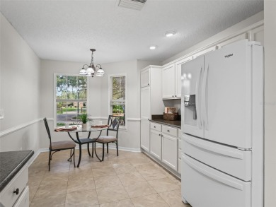 ROOF 2020. HVAC 2021. BEAUTIFULLY UPDATED Willow/Wisteria Model on The Links of Spruce Creek in Florida - for sale on GolfHomes.com, golf home, golf lot