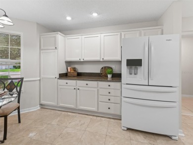 ROOF 2020. HVAC 2021. BEAUTIFULLY UPDATED Willow/Wisteria Model on The Links of Spruce Creek in Florida - for sale on GolfHomes.com, golf home, golf lot