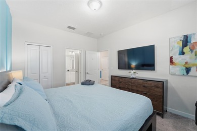 Overhauled by  Superhosts and designed for five-star stays -- on The Oasis Club at Champions Gate in Florida - for sale on GolfHomes.com, golf home, golf lot