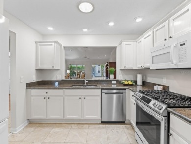 ROOF 2020. HVAC 2021. BEAUTIFULLY UPDATED Willow/Wisteria Model on The Links of Spruce Creek in Florida - for sale on GolfHomes.com, golf home, golf lot