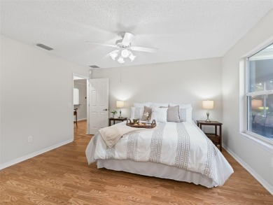 ROOF 2020. HVAC 2021. BEAUTIFULLY UPDATED Willow/Wisteria Model on The Links of Spruce Creek in Florida - for sale on GolfHomes.com, golf home, golf lot
