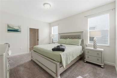 Overhauled by  Superhosts and designed for five-star stays -- on The Oasis Club at Champions Gate in Florida - for sale on GolfHomes.com, golf home, golf lot