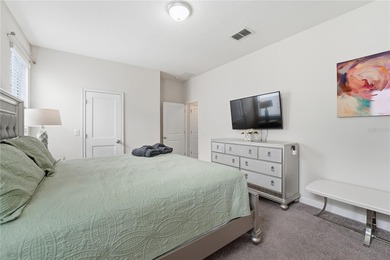 Overhauled by  Superhosts and designed for five-star stays -- on The Oasis Club at Champions Gate in Florida - for sale on GolfHomes.com, golf home, golf lot