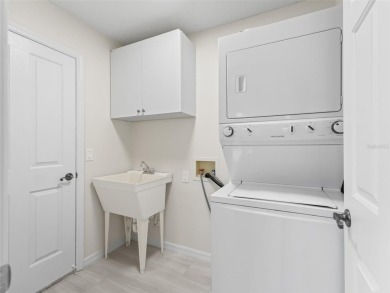 ROOF 2020. HVAC 2021. BEAUTIFULLY UPDATED Willow/Wisteria Model on The Links of Spruce Creek in Florida - for sale on GolfHomes.com, golf home, golf lot