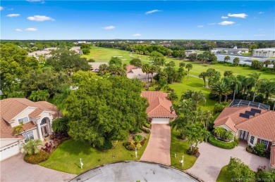 Welcome to this beautifully landscaped 4 bedroom, 2 bath home on St. Lucie Trail Golf Club in Florida - for sale on GolfHomes.com, golf home, golf lot