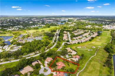 Welcome to this beautifully landscaped 4 bedroom, 2 bath home on St. Lucie Trail Golf Club in Florida - for sale on GolfHomes.com, golf home, golf lot