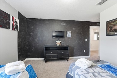 Overhauled by  Superhosts and designed for five-star stays -- on The Oasis Club at Champions Gate in Florida - for sale on GolfHomes.com, golf home, golf lot