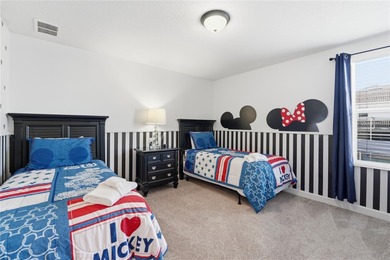 Overhauled by  Superhosts and designed for five-star stays -- on The Oasis Club at Champions Gate in Florida - for sale on GolfHomes.com, golf home, golf lot