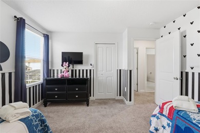 Overhauled by  Superhosts and designed for five-star stays -- on The Oasis Club at Champions Gate in Florida - for sale on GolfHomes.com, golf home, golf lot