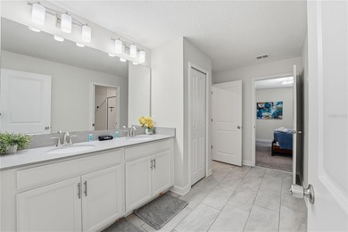 Overhauled by  Superhosts and designed for five-star stays -- on The Oasis Club at Champions Gate in Florida - for sale on GolfHomes.com, golf home, golf lot