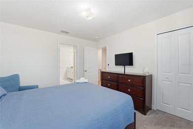 Overhauled by  Superhosts and designed for five-star stays -- on The Oasis Club at Champions Gate in Florida - for sale on GolfHomes.com, golf home, golf lot