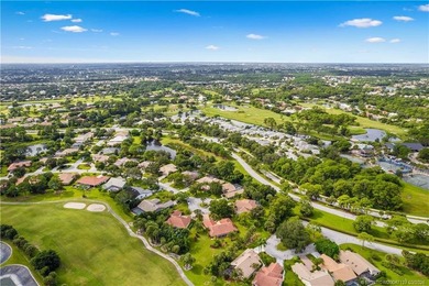 Set on over half an acre in a quiet cul-de-sac within Country on St. Lucie Trail Golf Club in Florida - for sale on GolfHomes.com, golf home, golf lot
