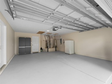 ROOF 2020. HVAC 2021. BEAUTIFULLY UPDATED Willow/Wisteria Model on The Links of Spruce Creek in Florida - for sale on GolfHomes.com, golf home, golf lot