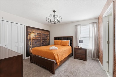 Overhauled by  Superhosts and designed for five-star stays -- on The Oasis Club at Champions Gate in Florida - for sale on GolfHomes.com, golf home, golf lot