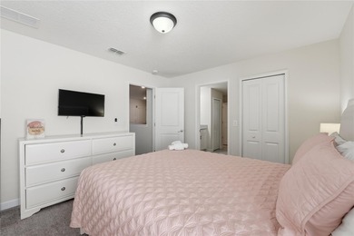 Overhauled by  Superhosts and designed for five-star stays -- on The Oasis Club at Champions Gate in Florida - for sale on GolfHomes.com, golf home, golf lot