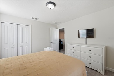 Overhauled by  Superhosts and designed for five-star stays -- on The Oasis Club at Champions Gate in Florida - for sale on GolfHomes.com, golf home, golf lot