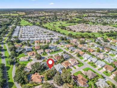 ROOF 2020. HVAC 2021. BEAUTIFULLY UPDATED Willow/Wisteria Model on The Links of Spruce Creek in Florida - for sale on GolfHomes.com, golf home, golf lot