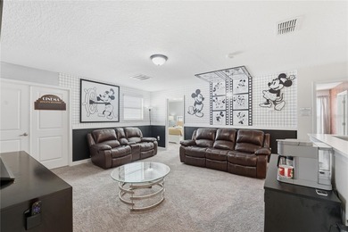 Overhauled by  Superhosts and designed for five-star stays -- on The Oasis Club at Champions Gate in Florida - for sale on GolfHomes.com, golf home, golf lot