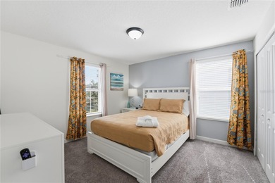 Overhauled by  Superhosts and designed for five-star stays -- on The Oasis Club at Champions Gate in Florida - for sale on GolfHomes.com, golf home, golf lot