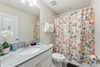 Overhauled by  Superhosts and designed for five-star stays -- on The Oasis Club at Champions Gate in Florida - for sale on GolfHomes.com, golf home, golf lot