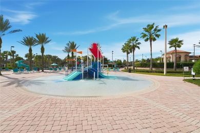 Overhauled by  Superhosts and designed for five-star stays -- on The Oasis Club at Champions Gate in Florida - for sale on GolfHomes.com, golf home, golf lot