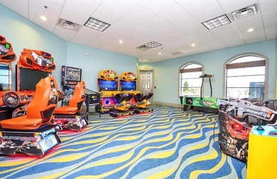 Overhauled by  Superhosts and designed for five-star stays -- on The Oasis Club at Champions Gate in Florida - for sale on GolfHomes.com, golf home, golf lot