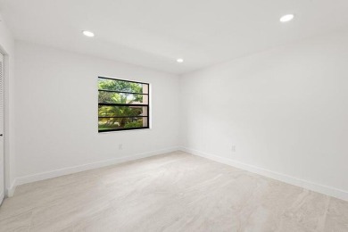 Stunning renovated 1st floor 2/2 condo overlooking beautiful on Boca Lago Golf and Country Club in Florida - for sale on GolfHomes.com, golf home, golf lot