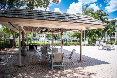 Welcome to your dream home in the vibrant 55+ community of on Wynmoor Golf Course in Florida - for sale on GolfHomes.com, golf home, golf lot