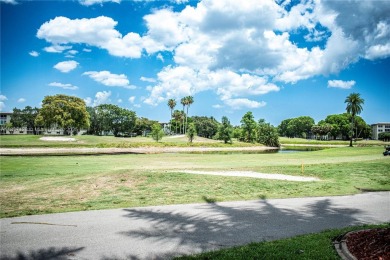 Welcome to your dream home in the vibrant 55+ community of on Wynmoor Golf Course in Florida - for sale on GolfHomes.com, golf home, golf lot