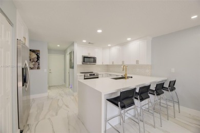Stunning transformation! Over $150,000 OF UPGRADES IN 2025: 3/2 on The Links At Boynton Beach - The Family Course in Florida - for sale on GolfHomes.com, golf home, golf lot