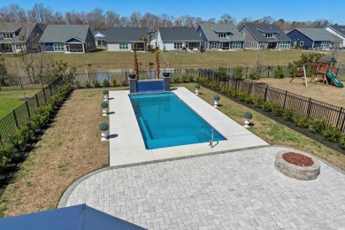 This custom-built raised beach home in the gated community of on Arrowhead Country Club in South Carolina - for sale on GolfHomes.com, golf home, golf lot