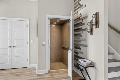 This custom-built raised beach home in the gated community of on Arrowhead Country Club in South Carolina - for sale on GolfHomes.com, golf home, golf lot