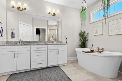 This custom-built raised beach home in the gated community of on Arrowhead Country Club in South Carolina - for sale on GolfHomes.com, golf home, golf lot