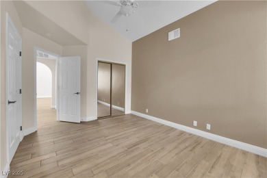 Welcome to 5205 Coral Glow, a stunning residence nestled within on Painted Desert Golf Club in Nevada - for sale on GolfHomes.com, golf home, golf lot